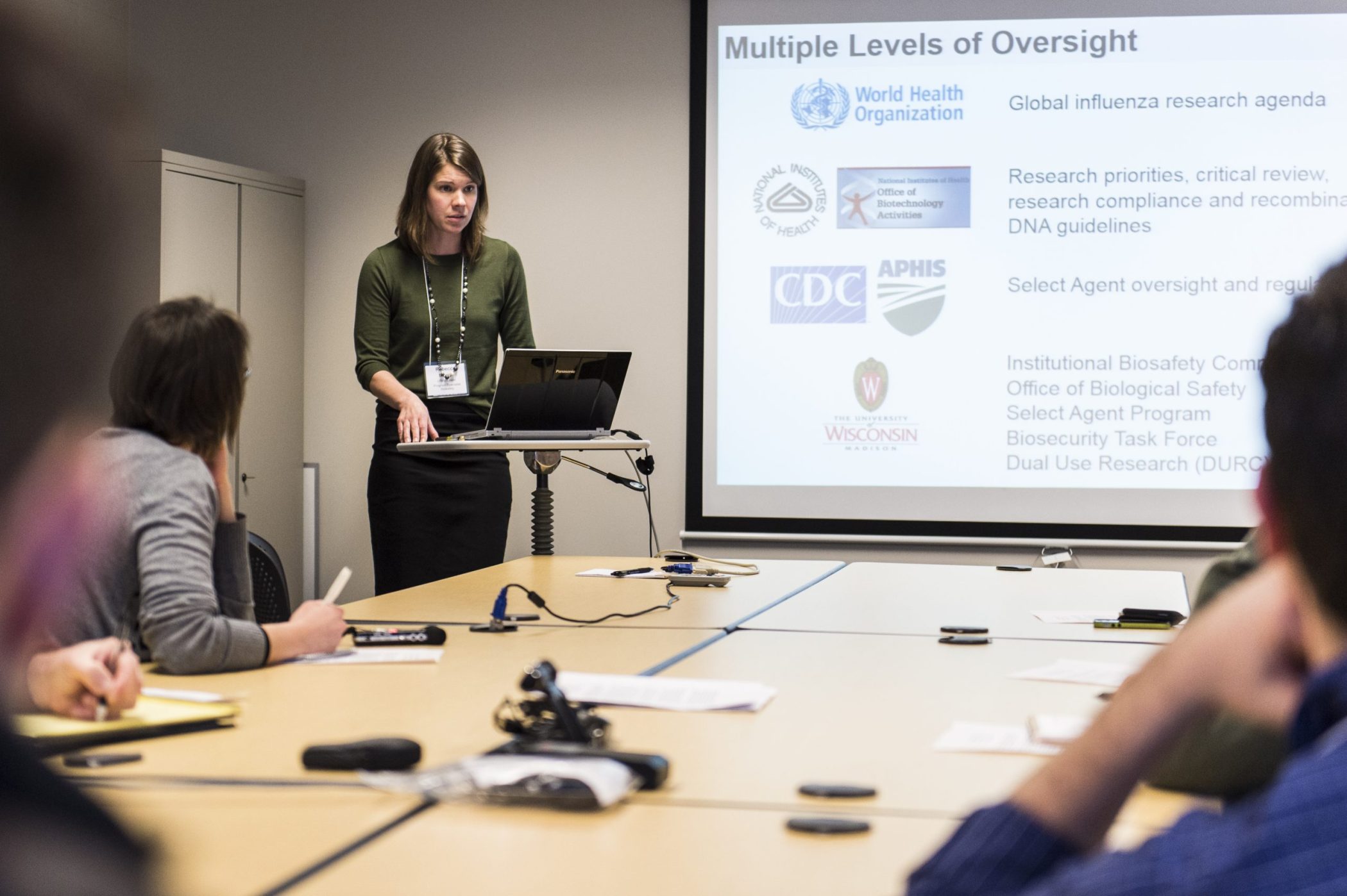 presenter at the front of a room