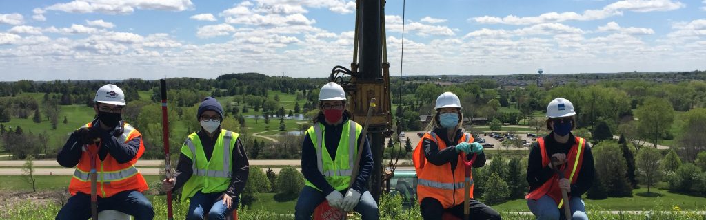 students outside with hardhats on